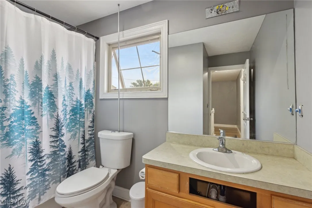 Bathroom featuring toilet and vanity