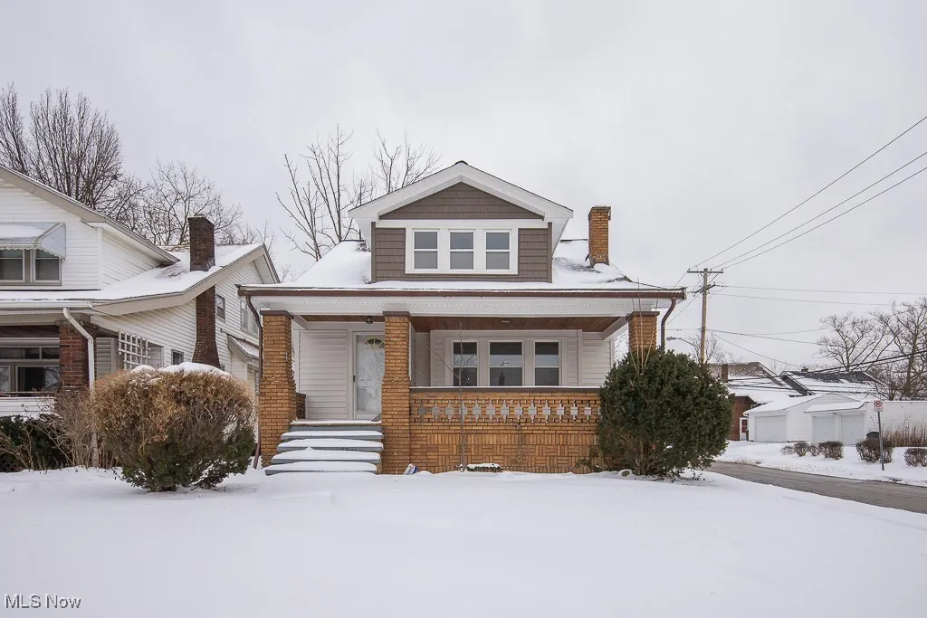 Bungalow featuring covered porch