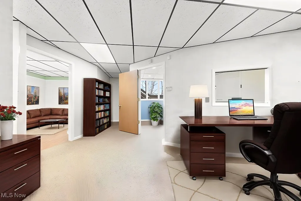 Home office featuring baseboards