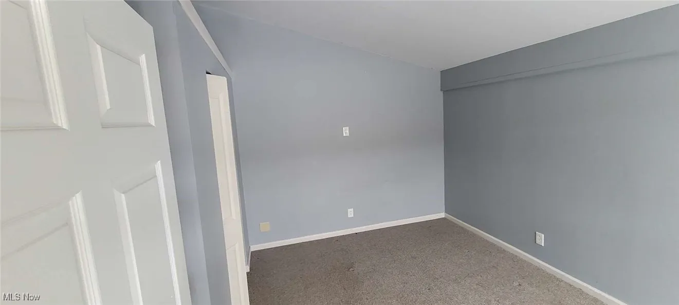 Spare room with carpet flooring