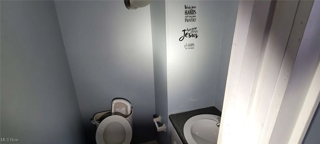 Bathroom with vanity and toilet