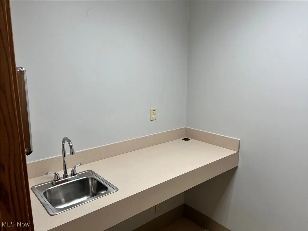 Laundry room with a sink