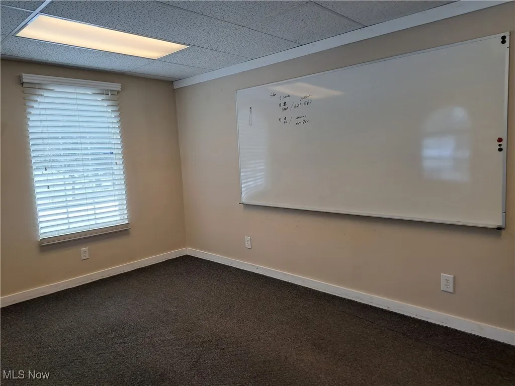 Office or conference room with dry erase board