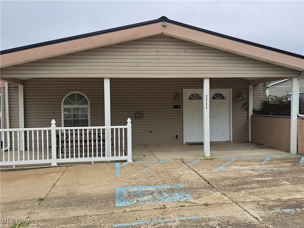View of front of house featuring covered porch