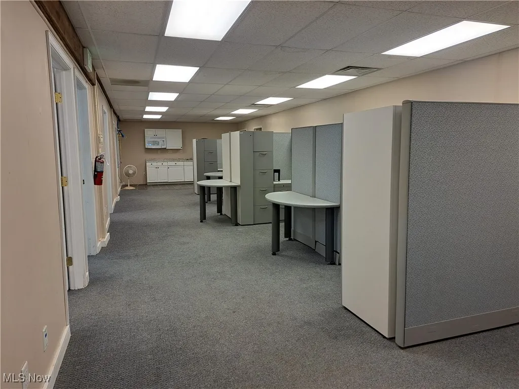Hallway featuring 4 nice cubicles