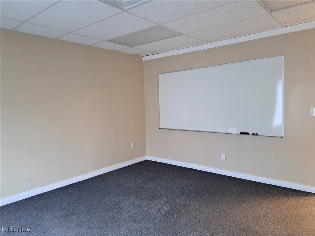 Office or conference room with dry erase board