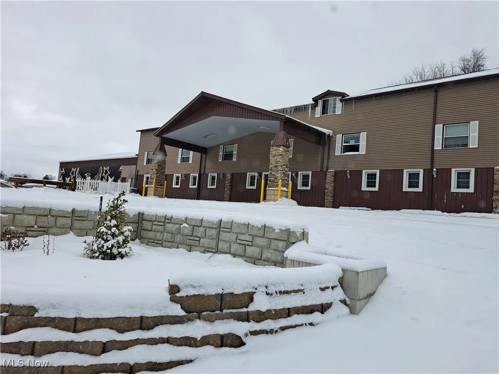 Front of Building featuring parking