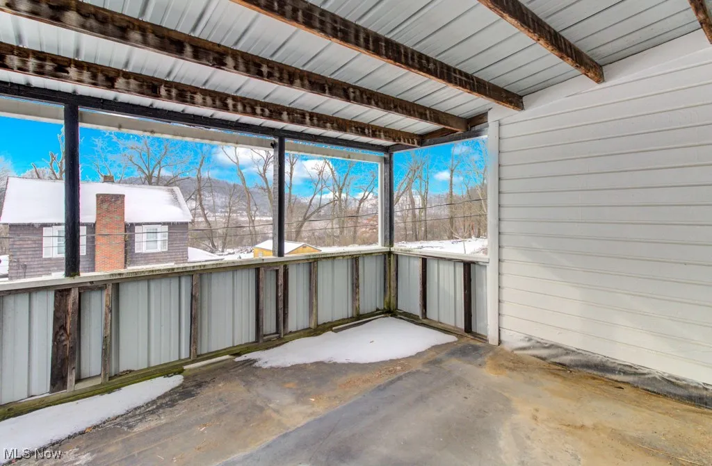 Private covered balcony off the main bedroom