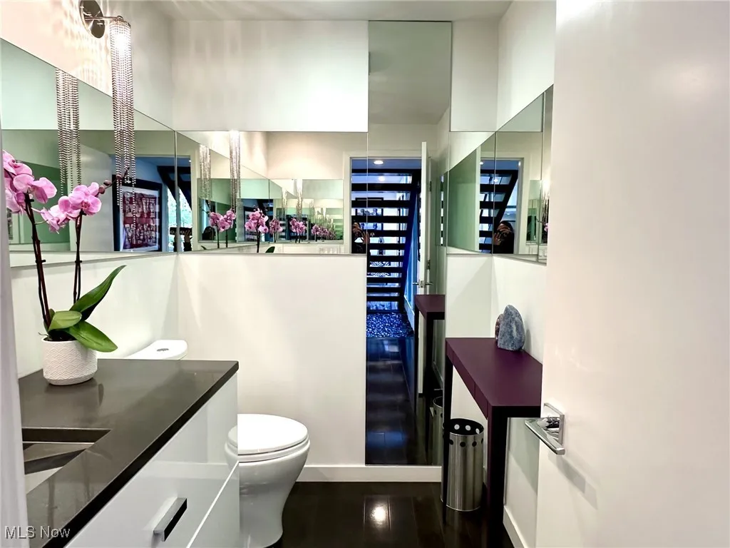 Bathroom with vanity and toilet