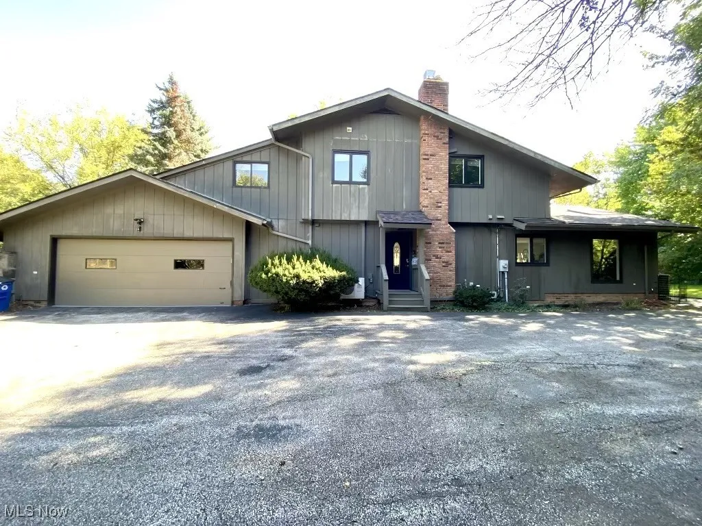 View of front of home featuring a garage