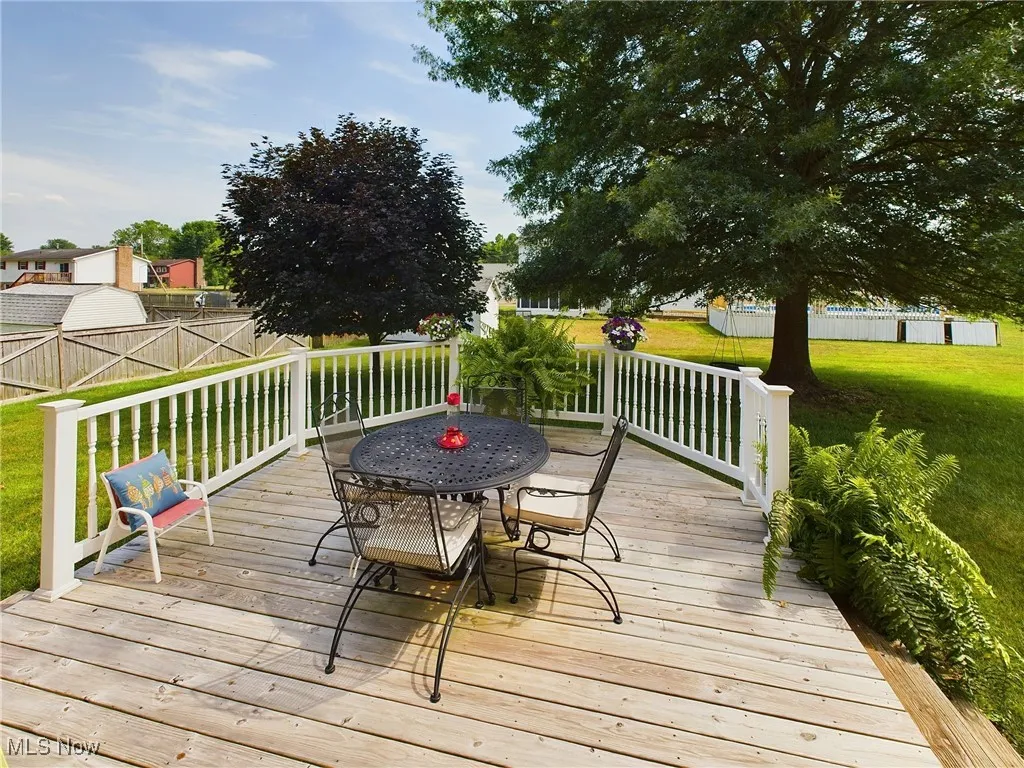 Deck featuring a yard