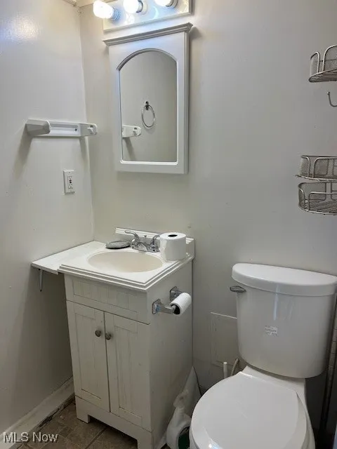 Bathroom with vanity and toilet