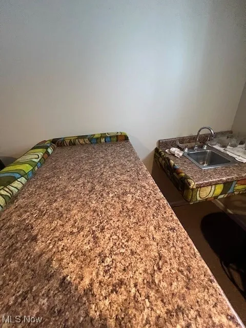 Bedroom featuring sink