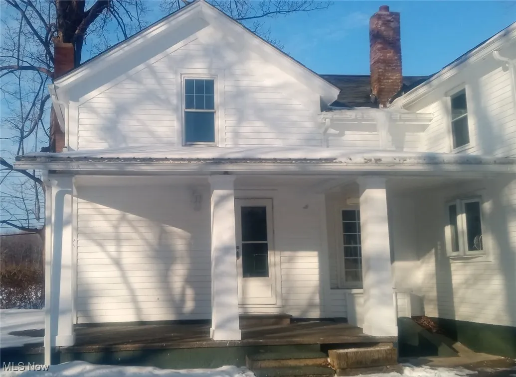 View of front of home with covered porch