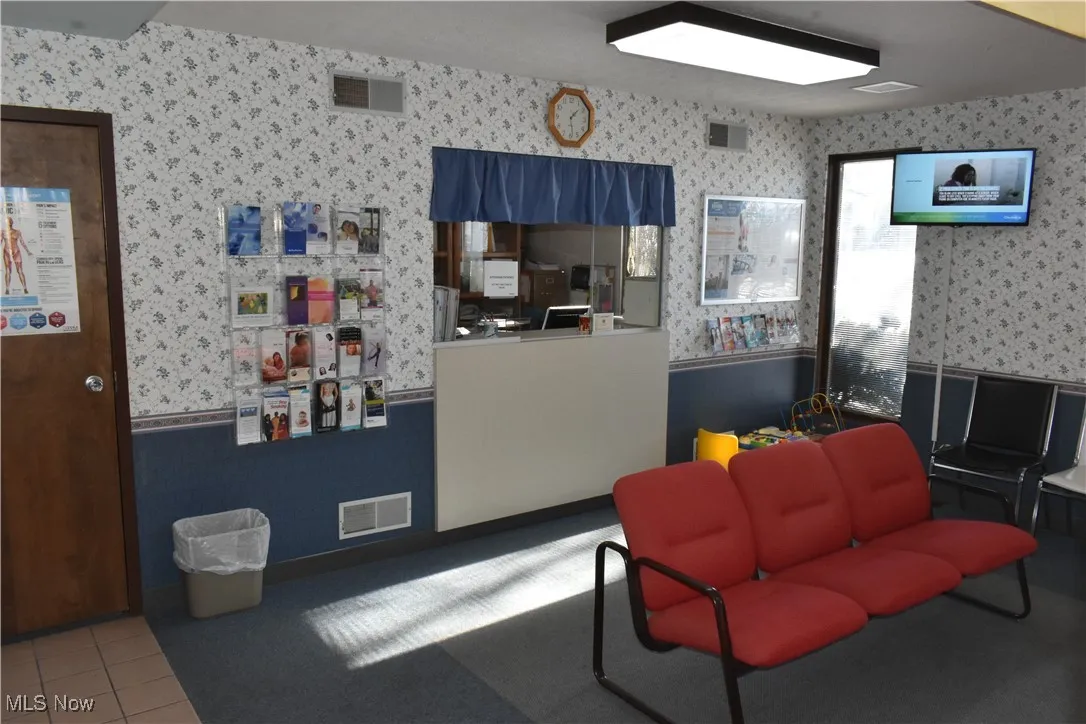 Living room with tile patterned flooring