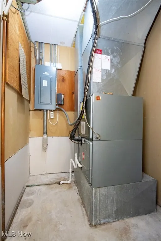 Utility room with heating unit and electric panel