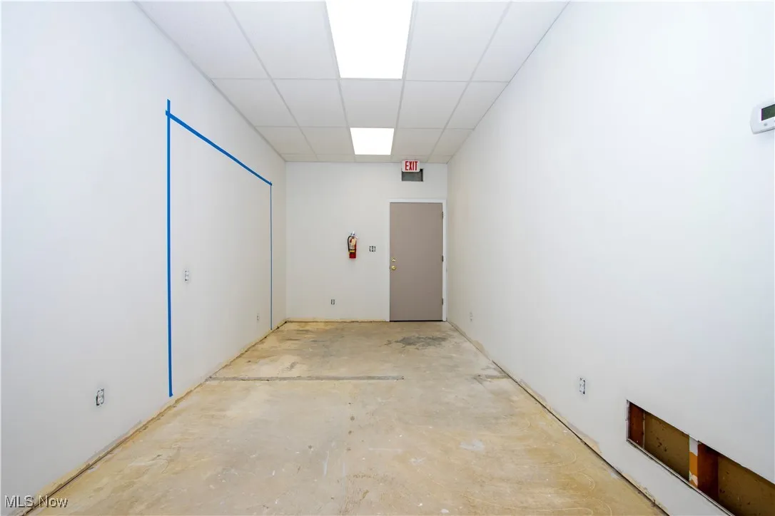 Spare room with a paneled ceiling