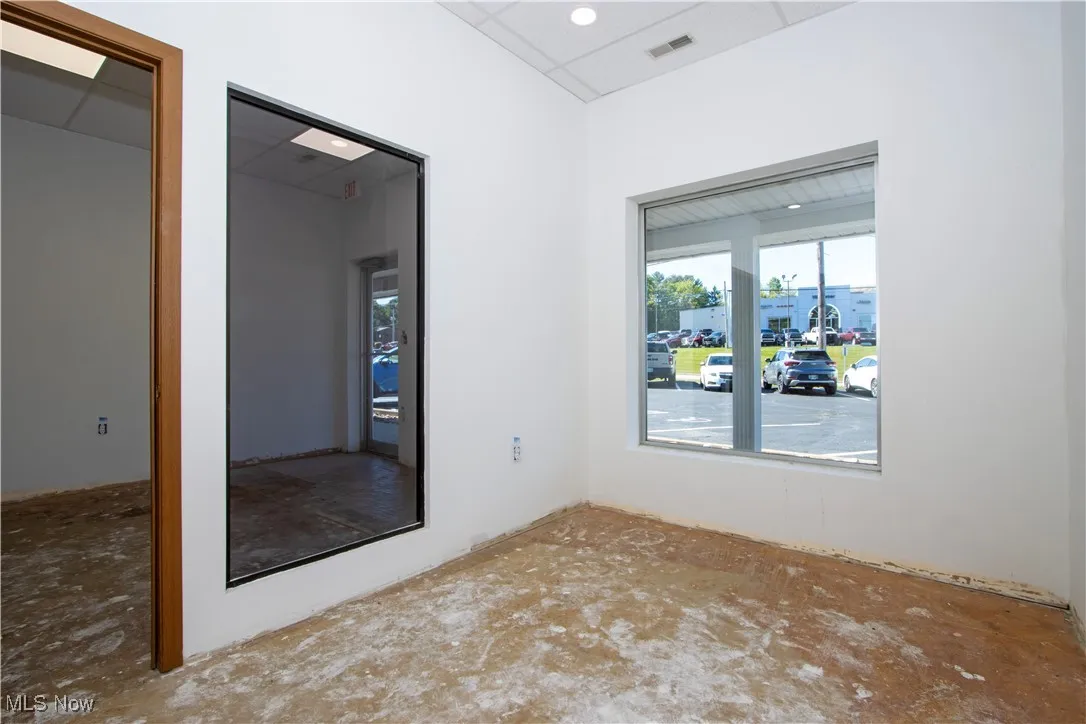 Spare room with a drop ceiling