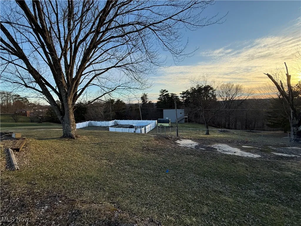 View of yard at dusk
