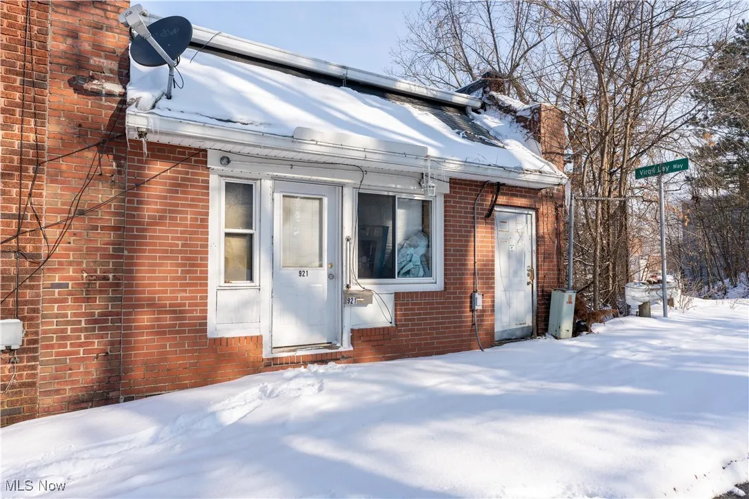 View of snow covered property entrance
