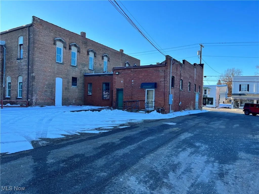 View of snow covered property