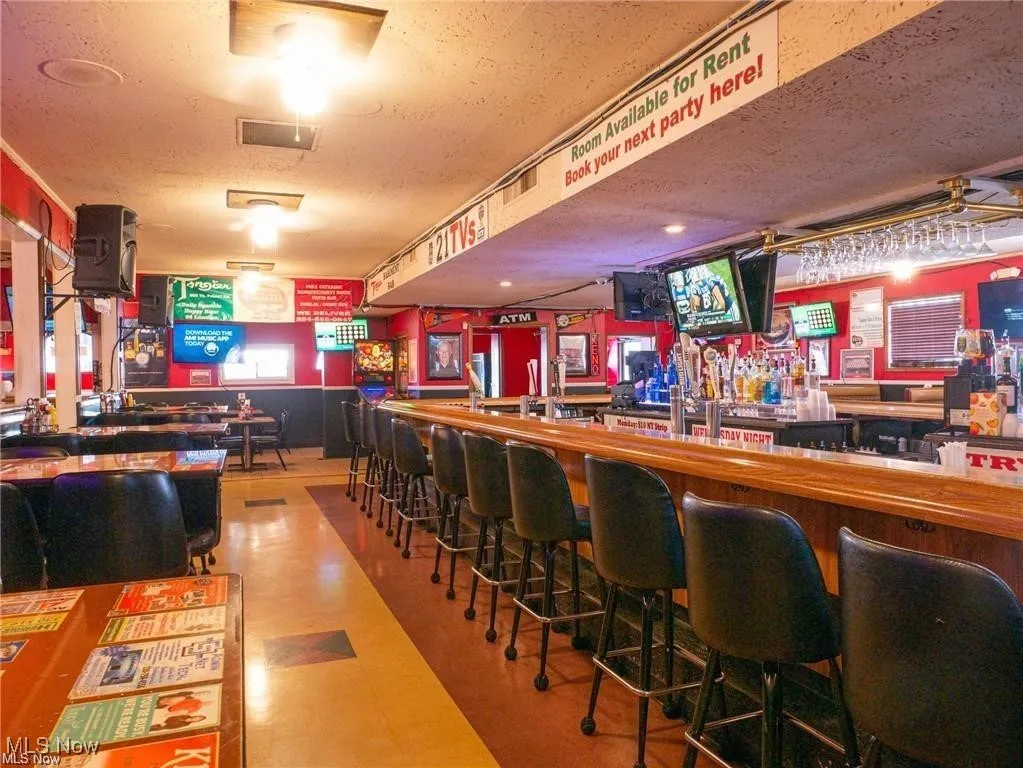 Bar featuring a textured ceiling