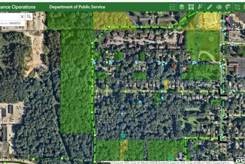 Sewer map- there are 4 manholes on the east property line (green circles).  Sewer line is 20' deep.