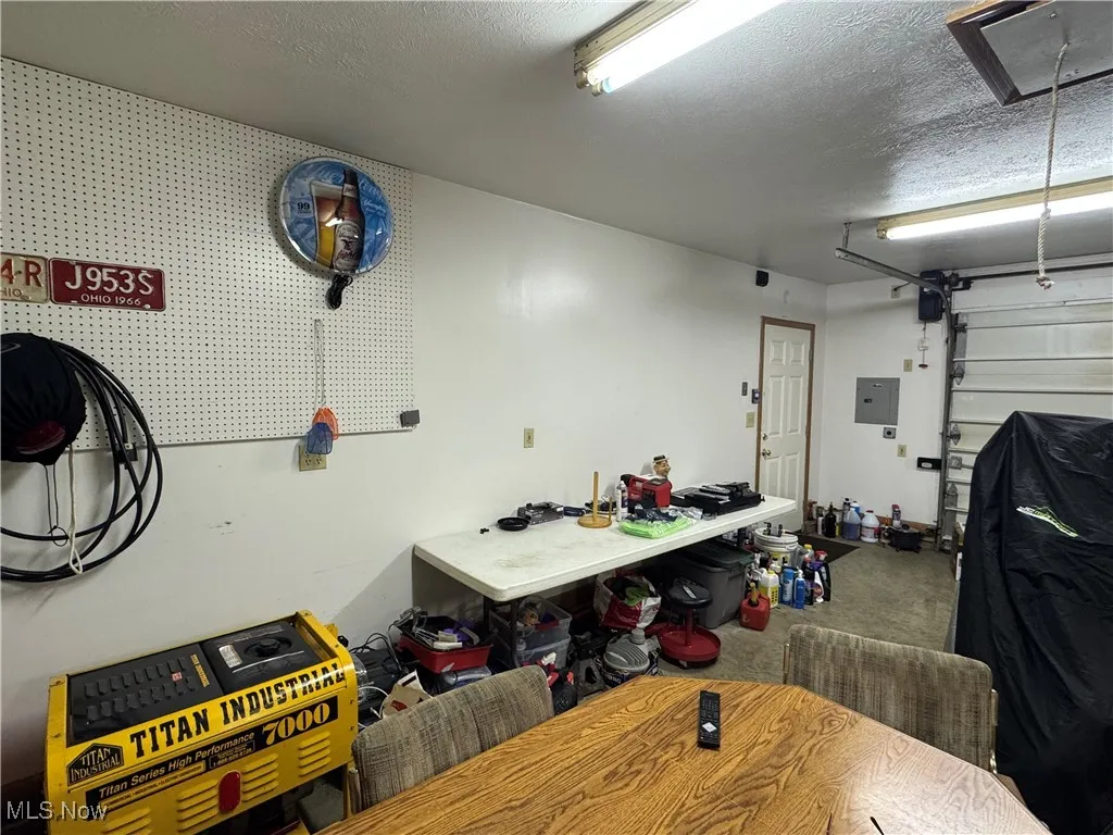 automatic garage opener on side of garage.