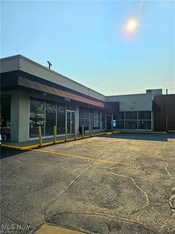 View of building exterior and parking lot