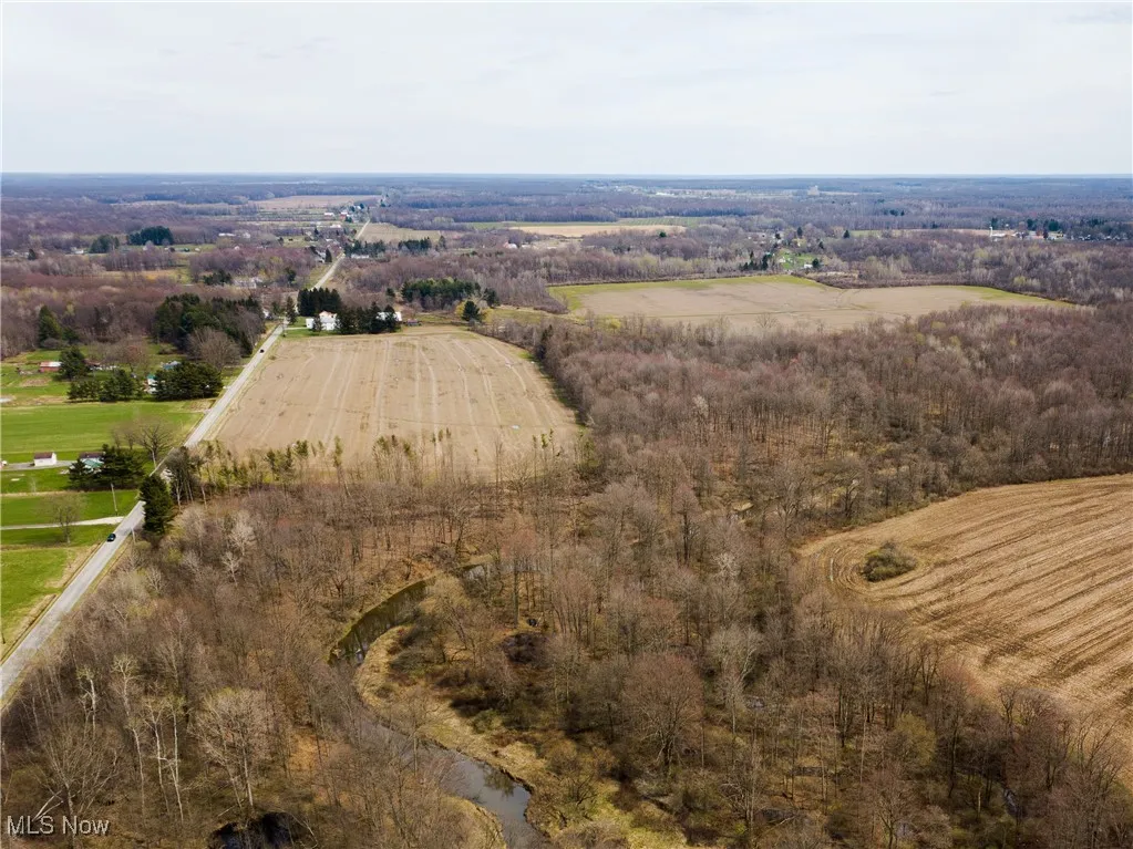 Aerial view of property's location with rural landscape