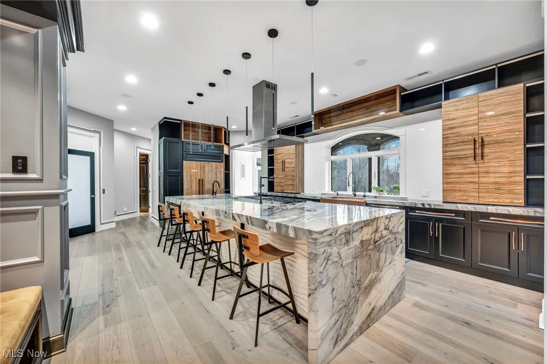 Kitchen with waterfall edge island.