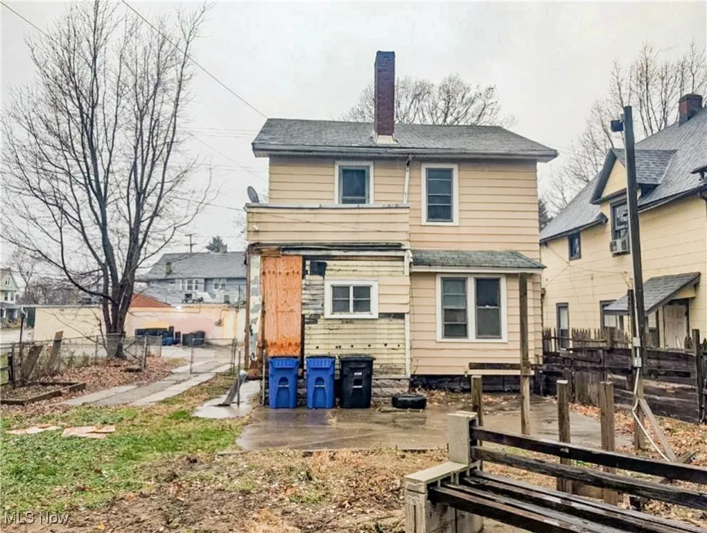 Rear view of property featuring a patio