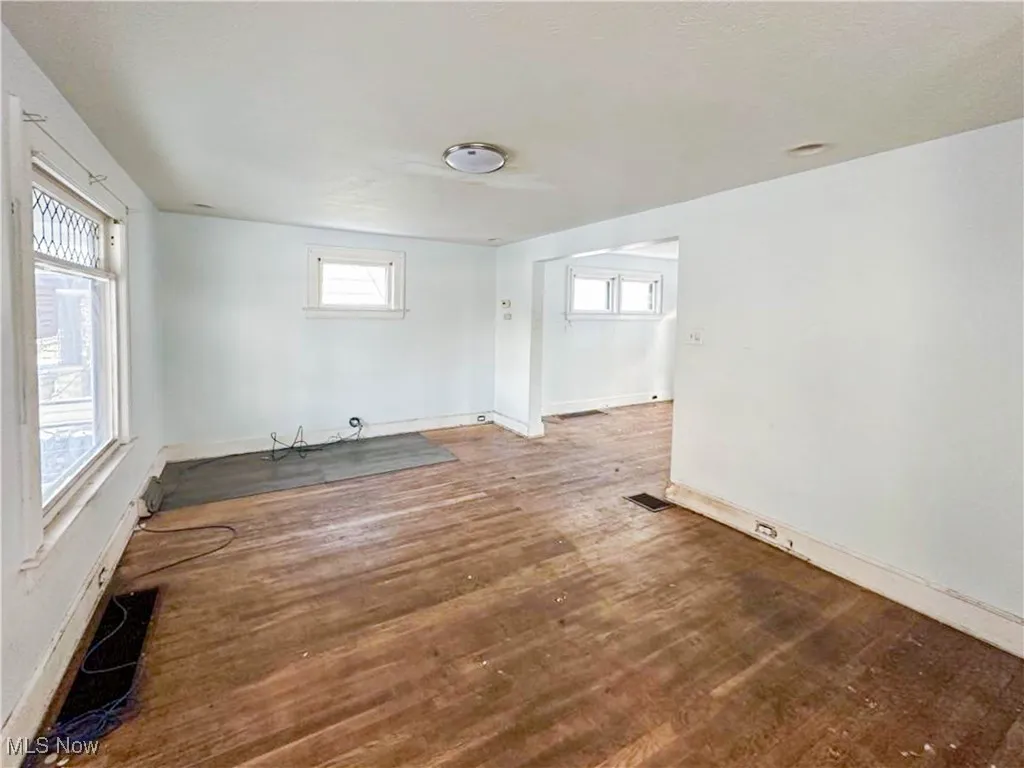Unfurnished room featuring hardwood / wood-style flooring