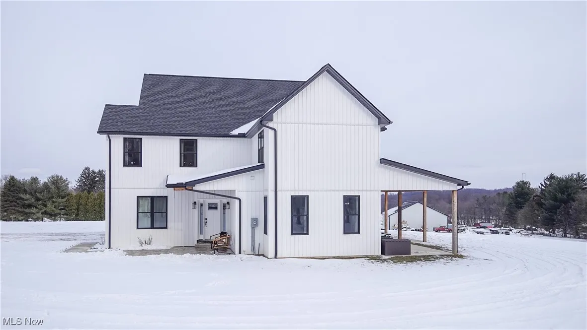 View of snow covered property