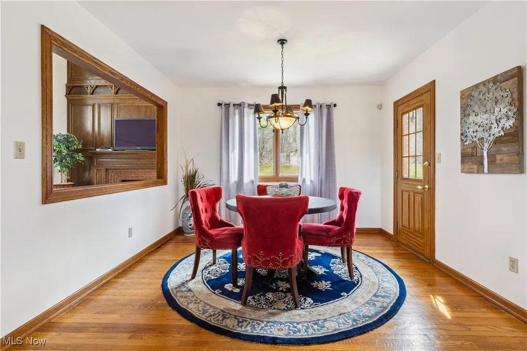 Eat in Kitchen open to the Great Room, Patio, and view of Backyard