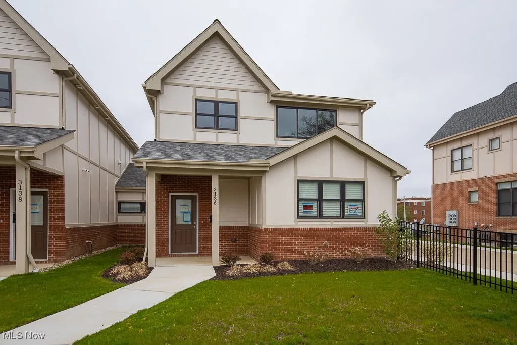 View of front of property with a front lawn