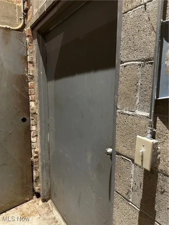 View of basement with a ramp