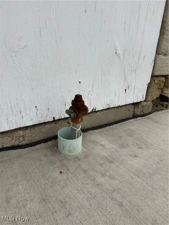 Gas tap on front of building