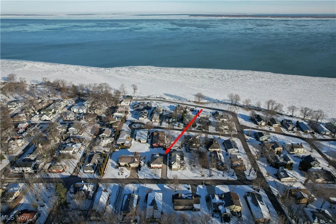 Aerial view with a beach view and a water view