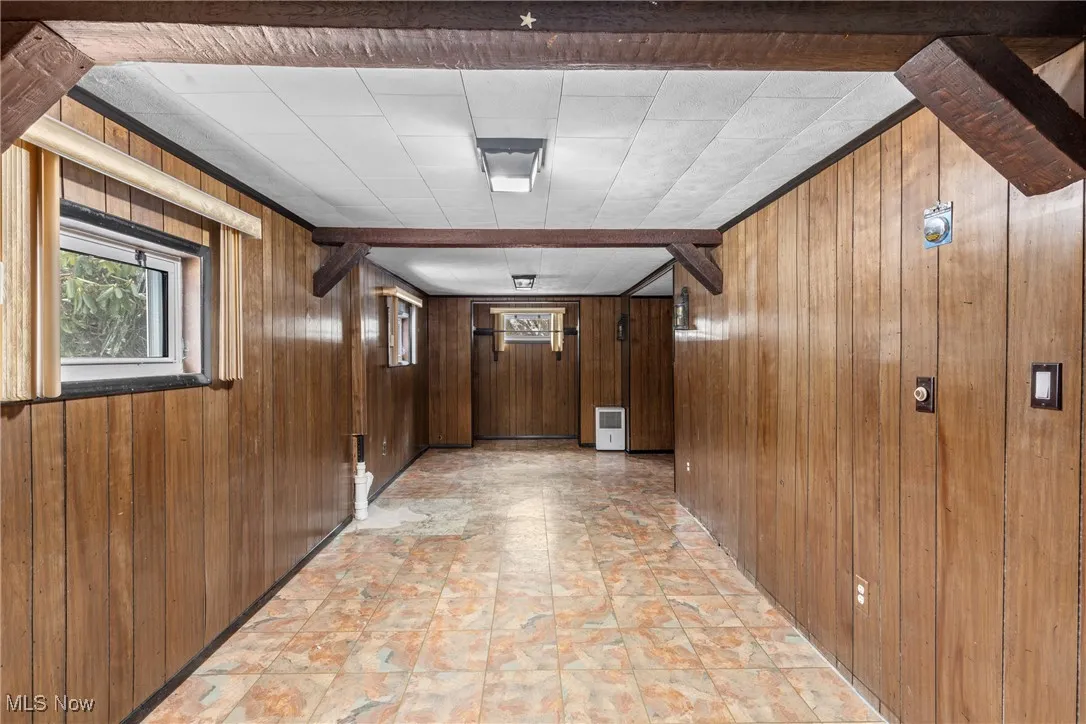 Hall with wood walls