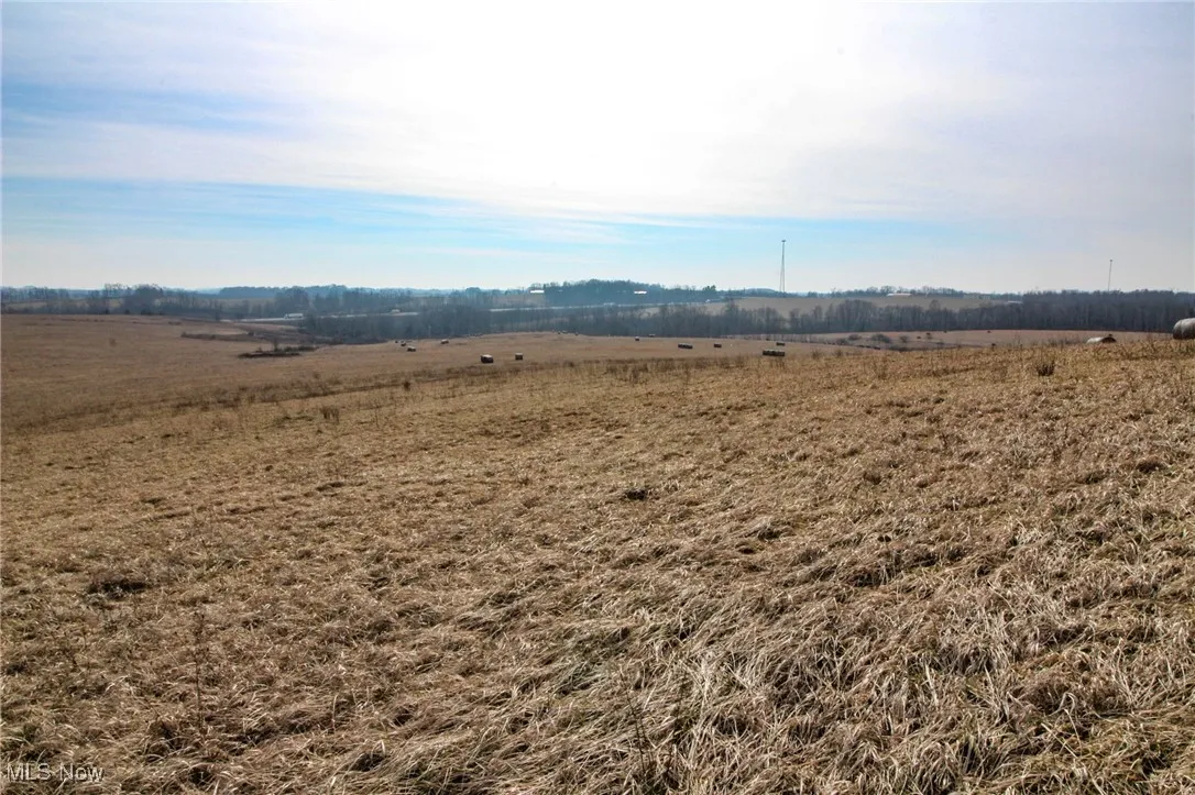Property view of mountains with a rural view