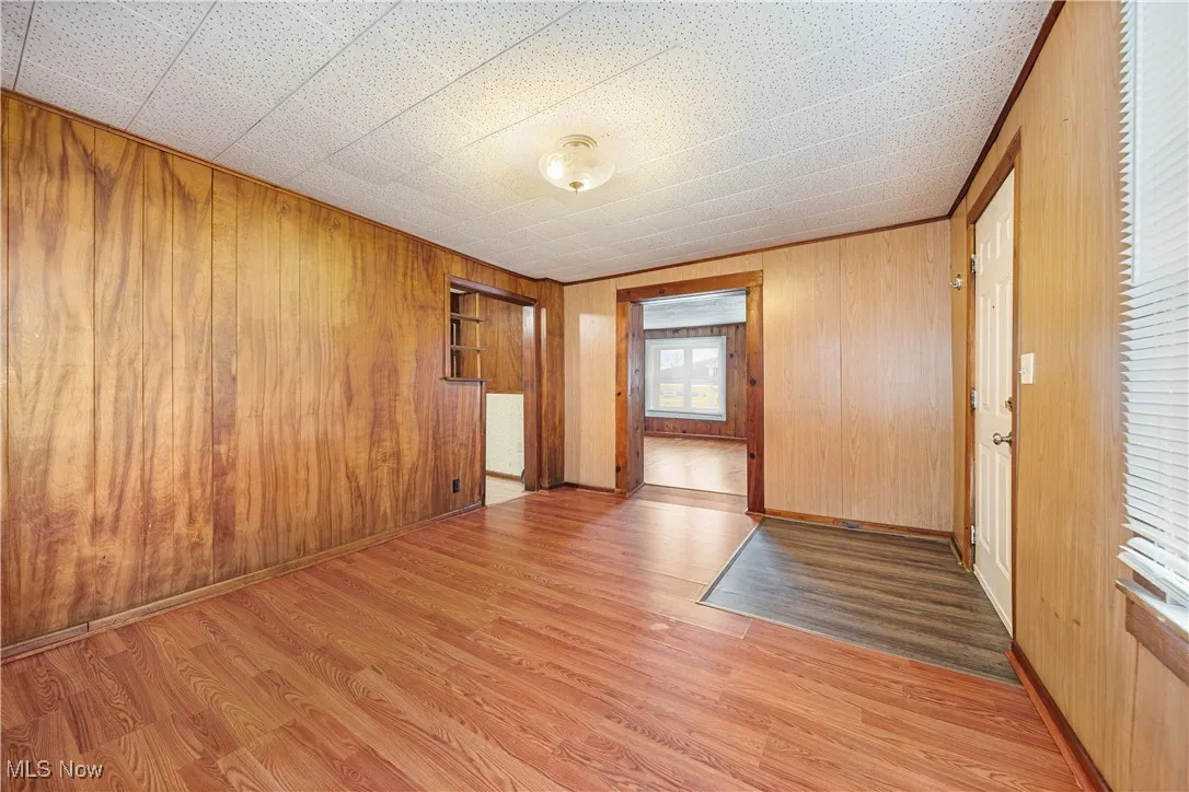Family broom open to kitchen / office space