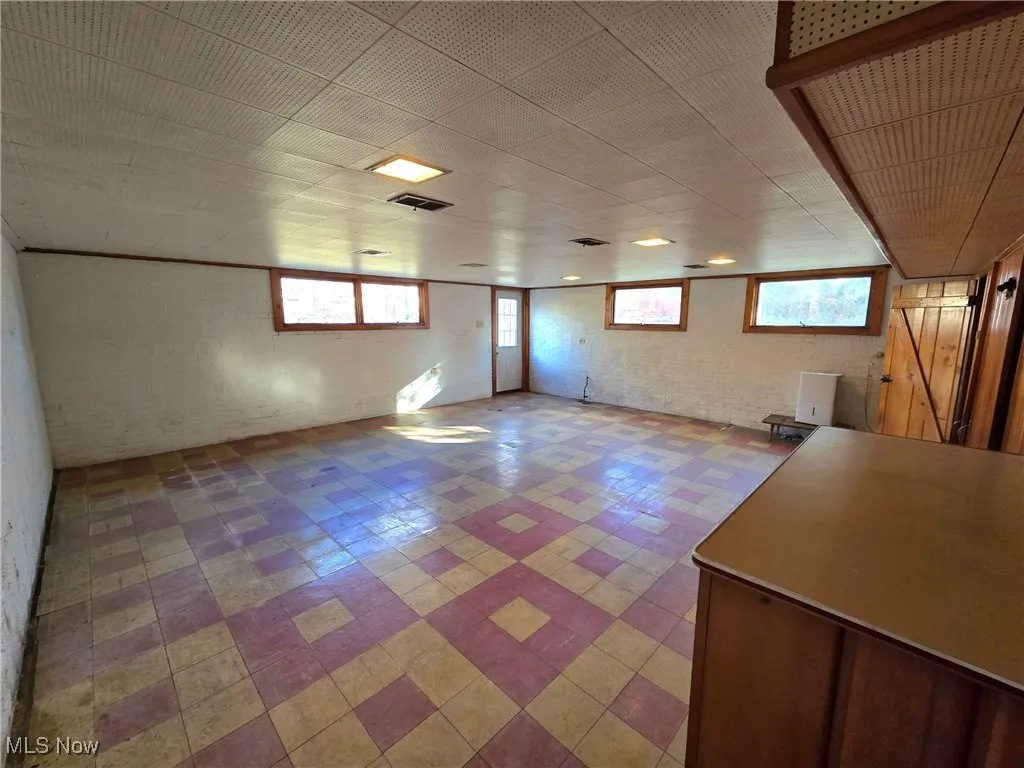 Basement with brick wall