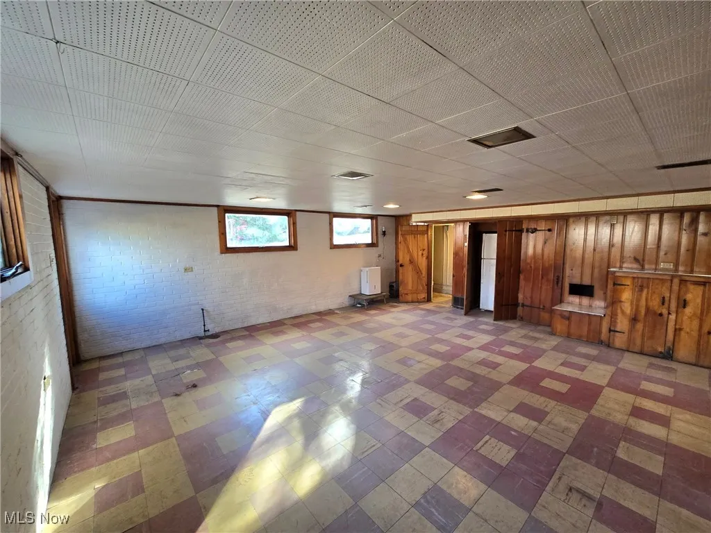 Basement with brick wall