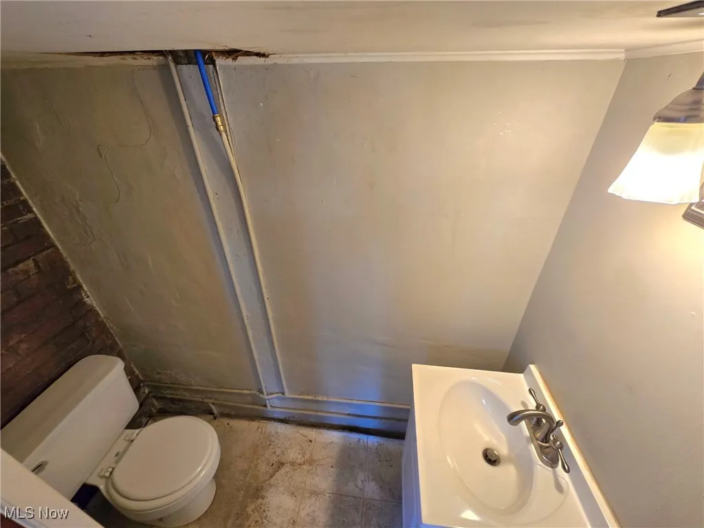 Bathroom with toilet and sink