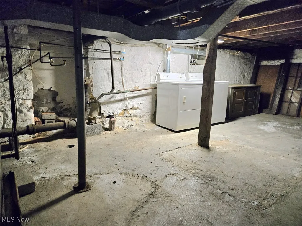Basement with washer and dryer