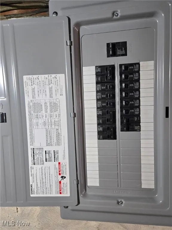 Utility room featuring electric panel