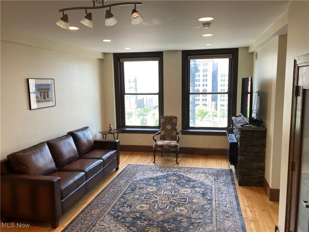 Living room with light wood-type flooring