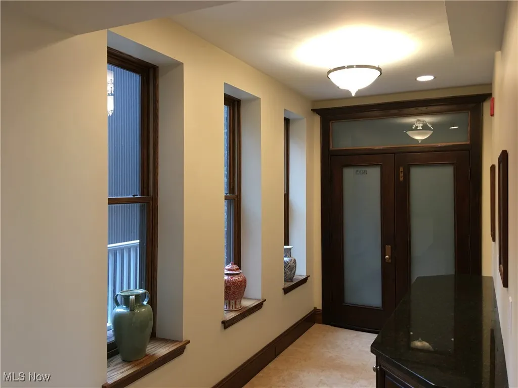 Hallway with french doors