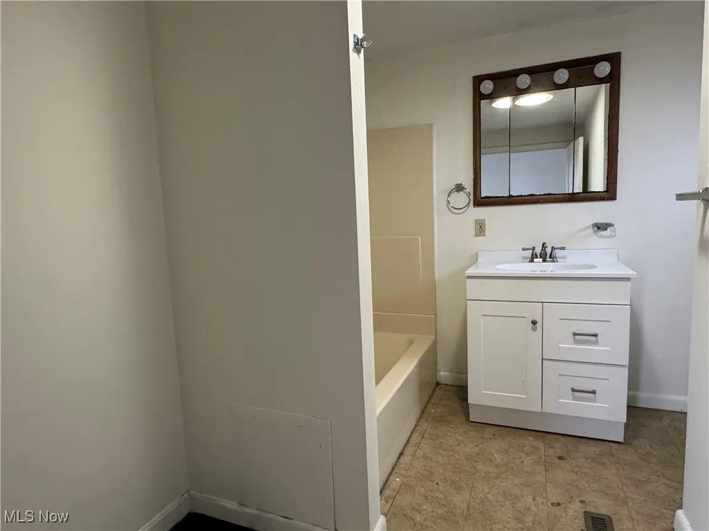 2nd floor Bathroom with vanity and a bathtub